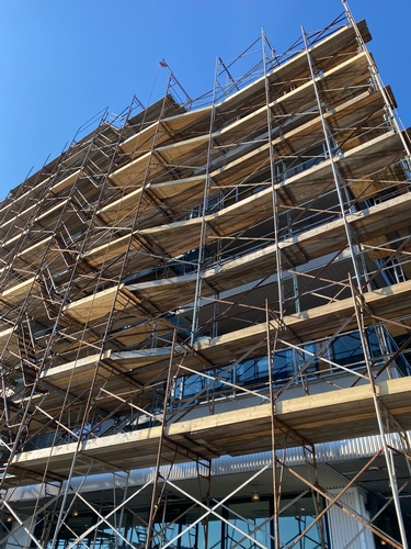 Scaffolding across the east side of the Meriel Marina Bay project